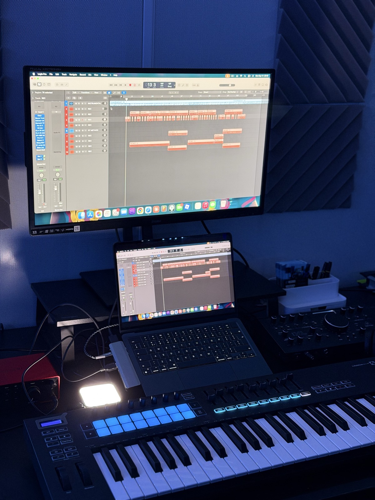 RT RECORDS production desk with dual monitors and MIDI keyboard